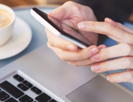 Someone using a smartphone.